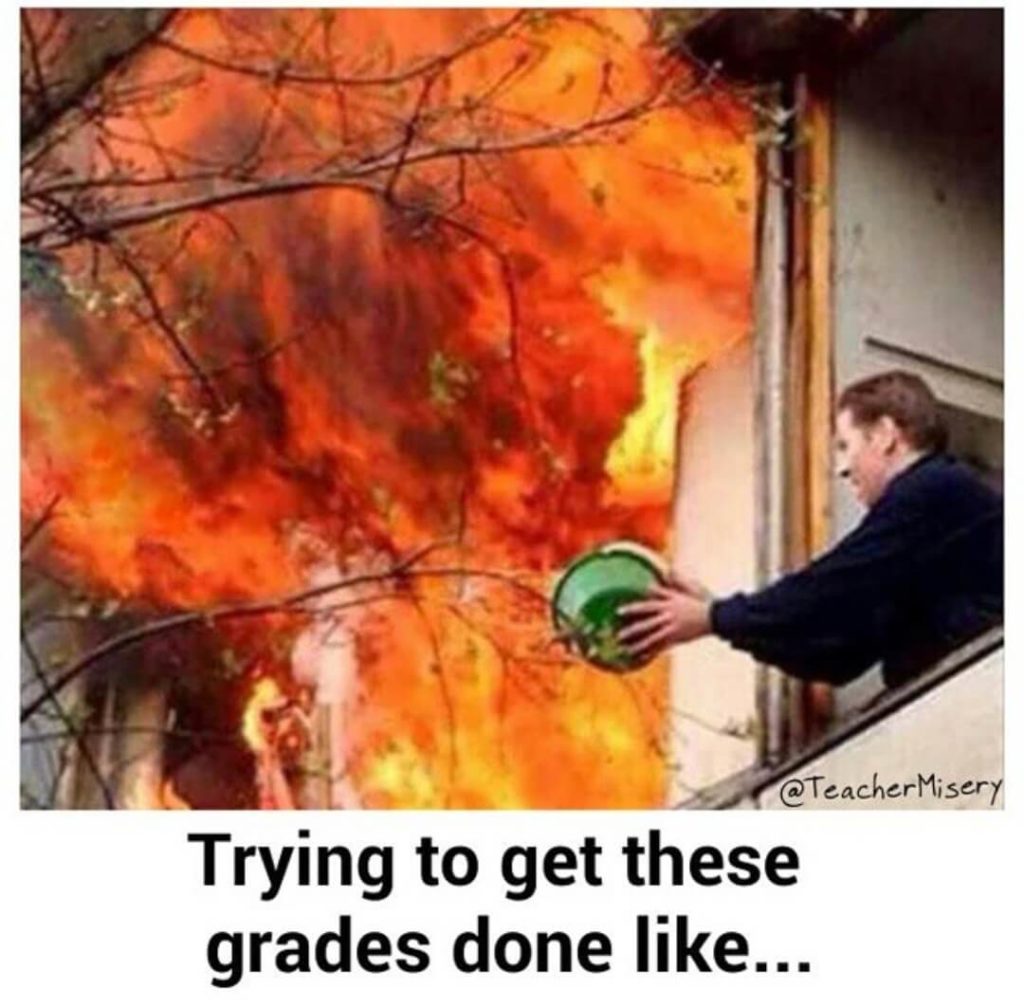 Man dumping a small bucket of water on a blazing fire with text overlay - Trying to get these grades done like...
