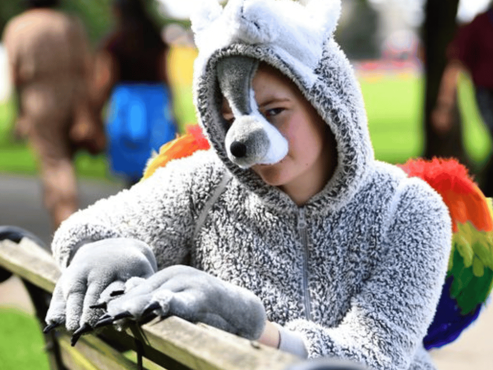 Boy in animal costume.