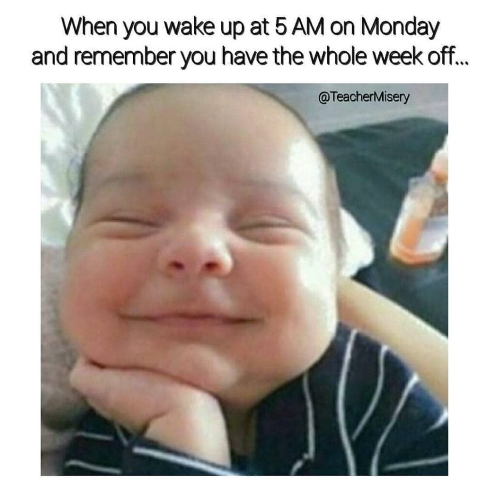 A very happy baby with text overlay: When you wake up at 5 AM on Monday and remember you have the whole next week off...