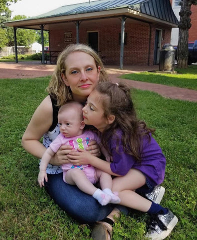 Founder of Teacher Misery, Jane Morris, with her two daughters.