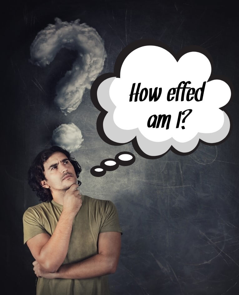 A tired and stressed male teacher stands in front of a question mark thinking the words "How effed am I?".