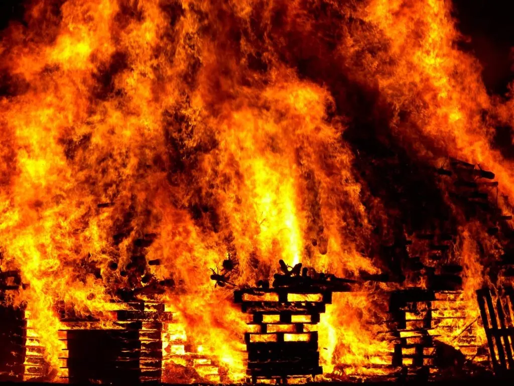 A picture of a burning building representing one angle for writing a teaching resignation letter.